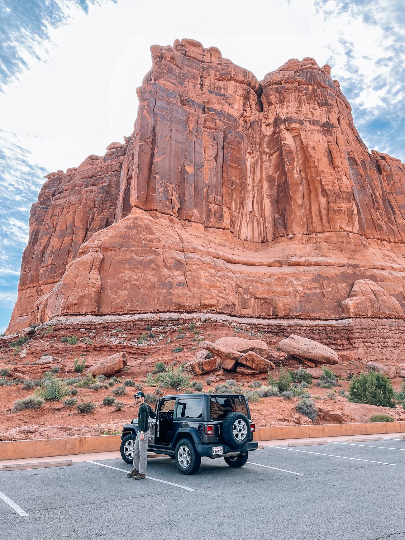Justin parked at a viewpoint in Arches NP