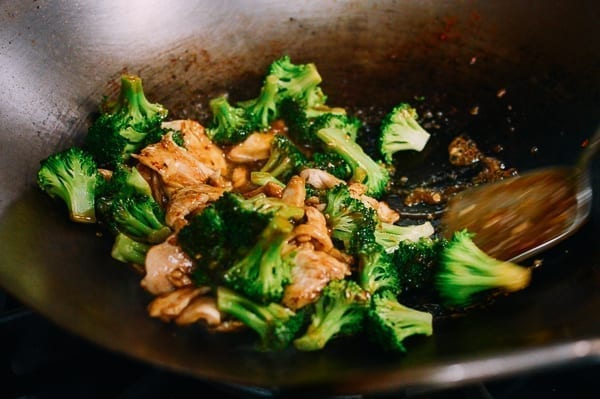 Stir-frying Chinese chicken and broccoli, thewoksoflife.com