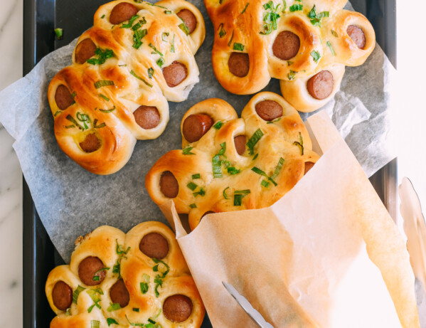 Chinese flower hot dog buns on tray